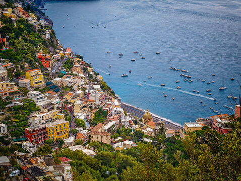 Stunning aerial drone panorama of Positano on the Amalfi Coast, Italy, colorful hillside houses, dramatic cliffs and the Mediterranean Sea