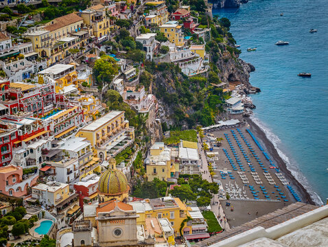 Stunning aerial drone panorama of Positano on the Amalfi Coast, Italy, colorful hillside houses, dramatic cliffs and the Mediterranean Sea