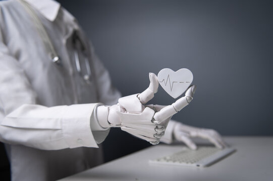 Close-up Robot Doctor Hand Holding White Heart Model for AI Cardiology Concept