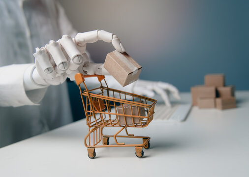Robotic Hand Putting Cardboard Package in Shopping Trolley with Keyboard Background