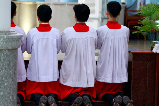 Young Altar Servers Kneeling at Nui Cui Shrine