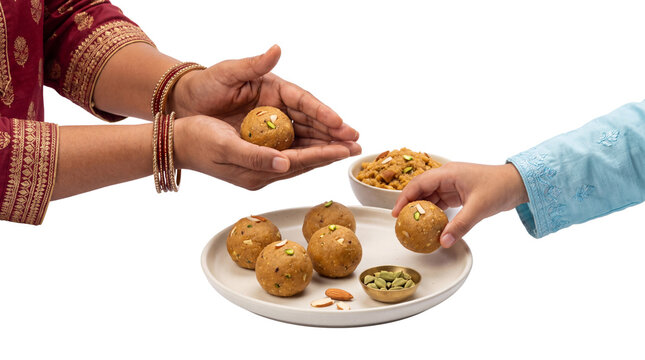 Traditional Indian Besan Laddu sweets, mother offering homemade dessert to child, festive golden gram flour balls with nuts and cardamom isolated PNG with Transparent Background