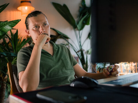 Focused man working at home 