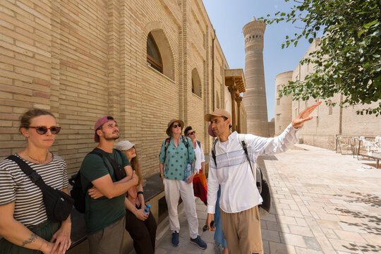 Group of People Listen to Guide in Bukhara, Uzbekistan