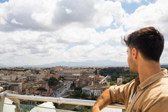 Young traveler taking in the eternal city from above