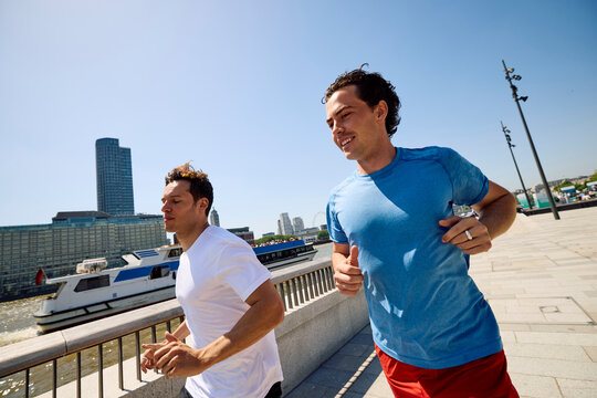 Running for exercise by the Thames River