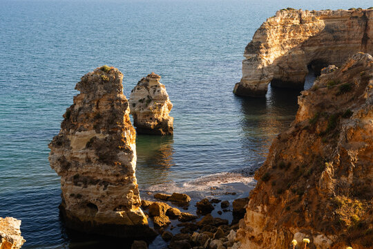 Scenic View of Rocky Cliffs by the Sea at Sunset Time. Portugal