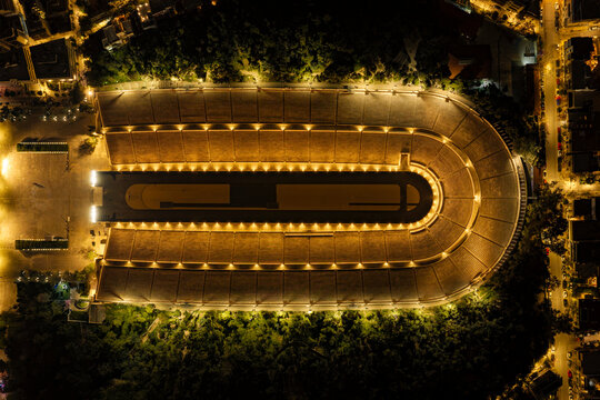 Panathenaic stadium aerial view at night, athens greece