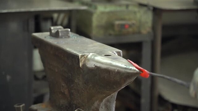 Crafting Hot Metal: The Art of Forging as a Blacksmith Shapes Red-Hot Steel with Precision and Expertise on the Anvil in a Workshop Setting
