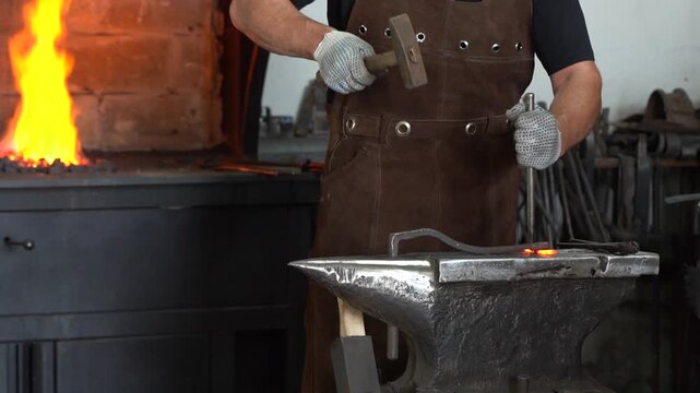 Master Blacksmith at Work Crafting Metal Objects with Hammer and Anvil, Showcasing Traditional Techniques and the Art of Forging in a Warm, Rustic Workshop Environment