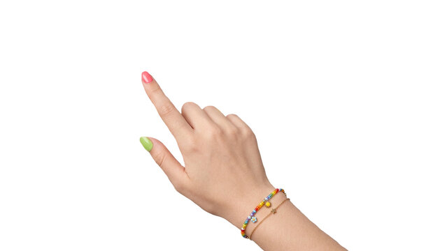 Elegant female hand pointing diagonally upward with bright nail polish, slender fingers and a colorful beaded bracelet, isolated cleanly on transparent background cutout