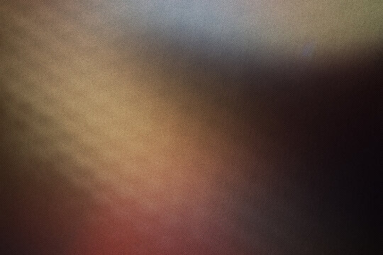 Abstract background surface showing diffused color gradients and subtle diagonal light rays