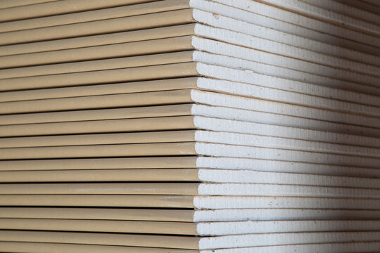 Drywall on a white background. Construction material for repairs