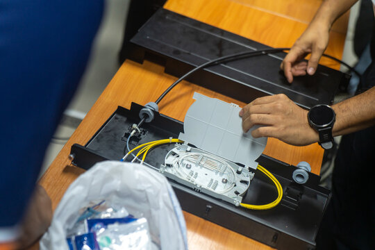 Technician Installing Fiber Optic Internet Connection