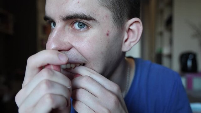 Man Cleaning Teeth With Dental Floss