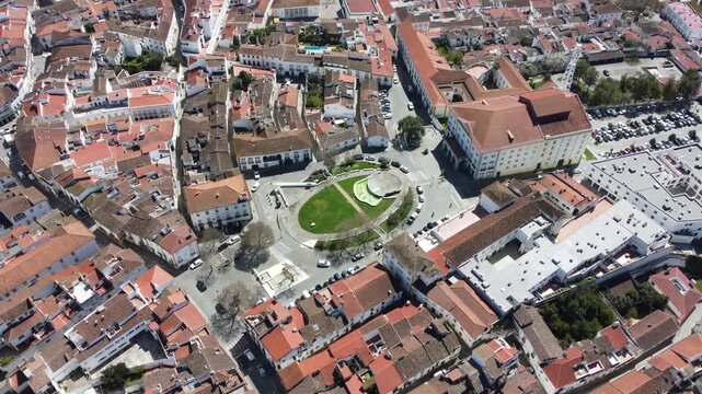 Aerial view of the historic center of &Eacute;vora, Portugal, a UNESCO World Heritage Site. Cinematic drone footage showcasing medieval streets, iconic monuments, and the city's timeless architecture.