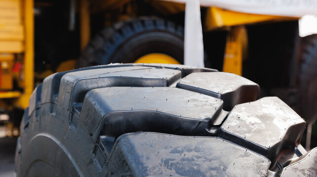 Close-up of heavy-duty tire in mining industry truck