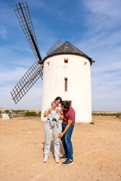 Family bonding at a traditional windmill in Tembleque, Toledo
