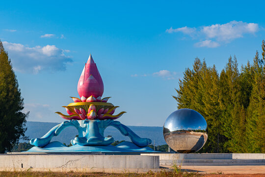 Scenic religious landmark along the Mekong River featuring the impressive Pathum Rat Thamma Chedi, famous for its unique lotus inspired architecture and annual Ok Phansa celebrations.