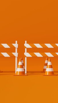 Front view traffic cones and safety barrier in orange on a orange background for road safety and construction warning. Vertical video.