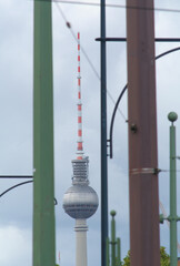 View of the Berlin TV Tower with city pillars and supports © saprygins