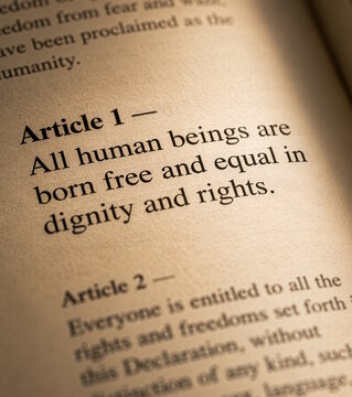 Close up of book page showing Article 1 of Universal Declaration of Human Rights