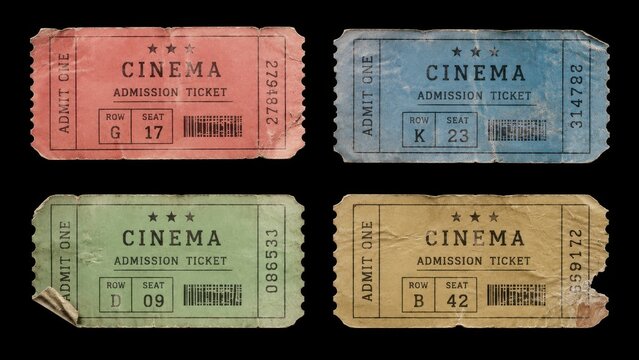Four worn vintage cinema admission tickets on black background