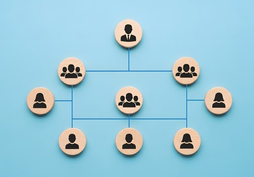 Organizational chart represented by wooden circles with icons on a blue background surface