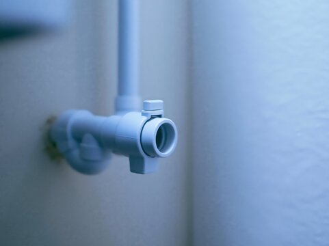 Condensate drain line with p trap and float switch in utility closet