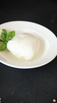 Mozzarella curd cheese mozzarella di bufala appetizer food preparation dish tasty snack fresh and delicious gourmet rustic food background on the table&nbsp; rustic food top view copy space
