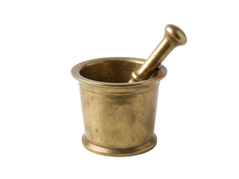 An antique brass mortar and pestle set, showing signs of aged metal patina, isolated on a black background, for culinary or, historical display isolated on a transparent background