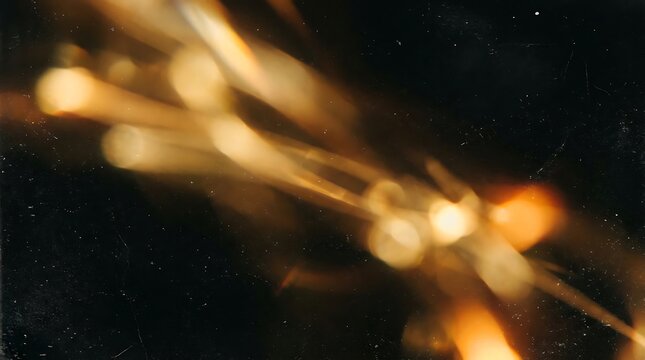 Bright golden sparks glowing in the dark night