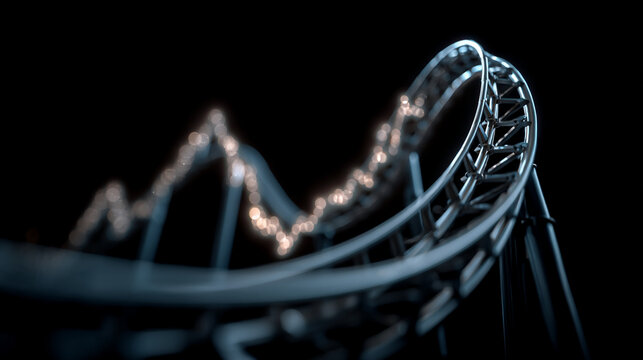 Dramatic roller coaster track against dark night sky with abstract light trails