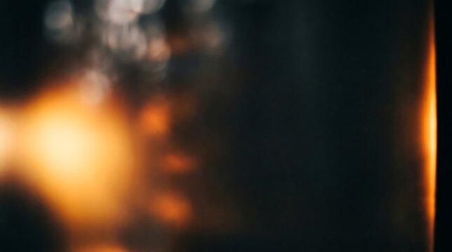 Abstract light leak flare on dark background