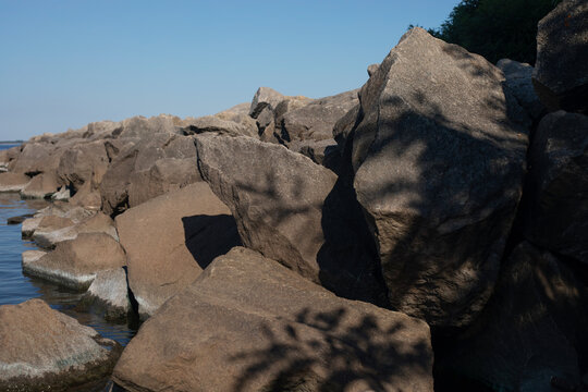 Massive boulders forming a riprap shoreline protection structure