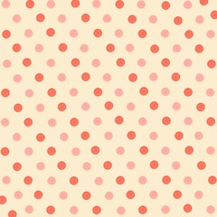 Pink and orange polka dot pattern background on a beige backdrop © Ko