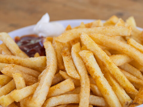 Crispy French Fries Served with Ketchup and Dip
