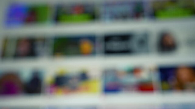 Blurred view of a computer display screen scrolling background