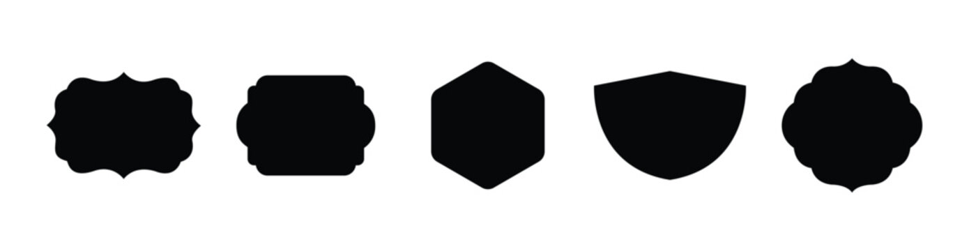 A collection of five decorative black silhouette labels or frames with unique vintage shapes isolated on a white background