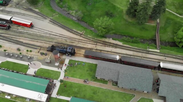 HILL CITY, SD - JULY 2019: Aerial view of city train station. The train connects  the city with Keystone. Slow motion
