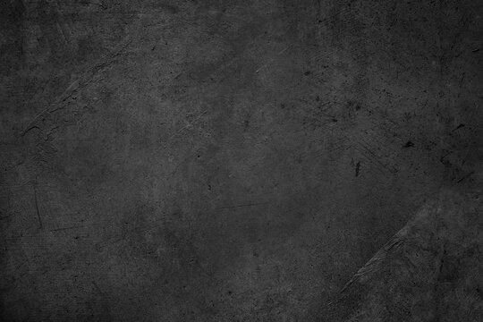 Dark grey textured concrete wall background