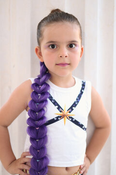 The little girl dressed in the costume of the K-pop character Rumi