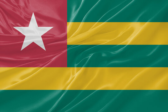Togo Waving Flag Background with Silk Fabric Texture