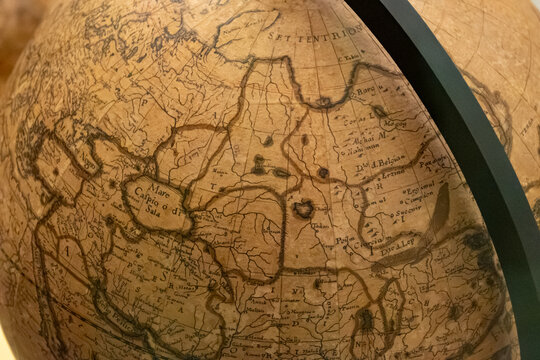 Detailed history of geographical discoveries in Middle Ages, as shown on medieval globes, maps, including ocean voyages and cartography, development of sea routes, discovery continents