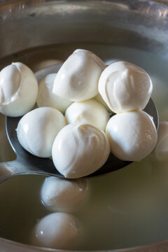 Fresh buffalo mozzarella or mozzarella di bufala white soft cheese in balls