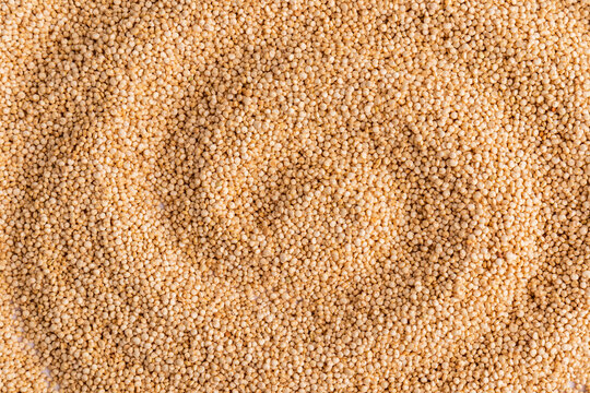 Close-up texture background of dry quinoa grain pattern