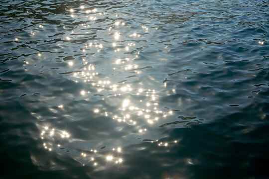 Sunlight reflections on Mediterranean sea water in Sicily