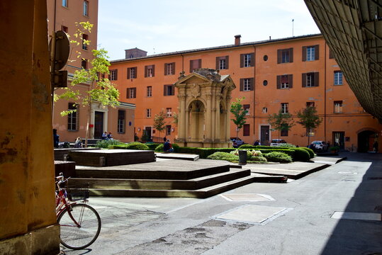 European Sunny City Square with San Domenico Monument and Bicycle in Bologna Italy for Travel Background