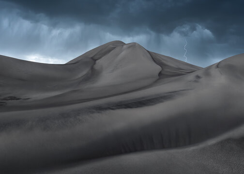 Storm clouds over Saujil Dunes in Catamarca, Argentina