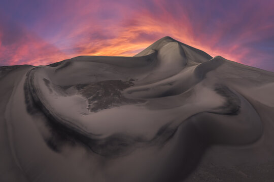 Saujil Dunes desert landscape at dramatic sunset, Argentina